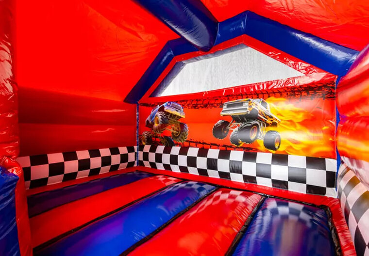 Springkussen met glijbaan - Monstertruck