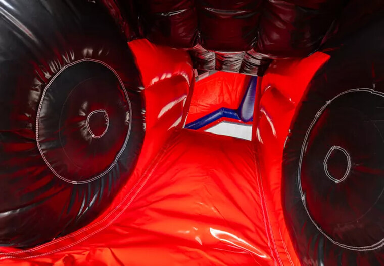 Springkussen met glijbaan - Monstertruck